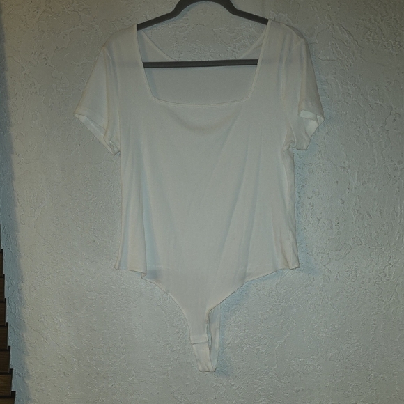 unbranded Tops - Elegant White Women's Body Suite Top